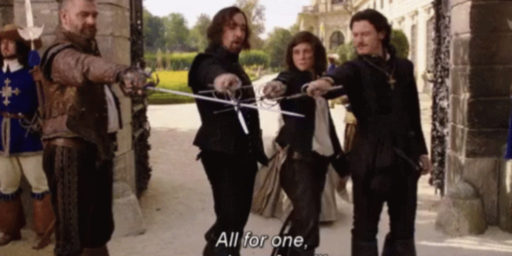 Three musketeers are raising their swords, the subtitle reads 'all for one'